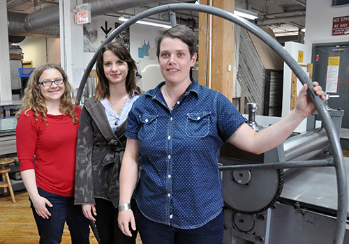 Guelph fine arts graduates Sara Kelly, Laura Bydlowska and Anna Gaby-Trotz work at OpenStudio and keeping the printmaking tradition alive.