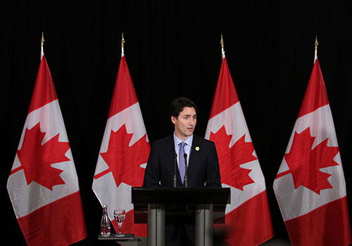 Justin Trudeau with Canadian Flags