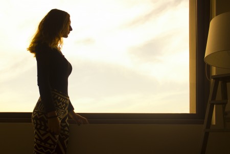 woman by window
