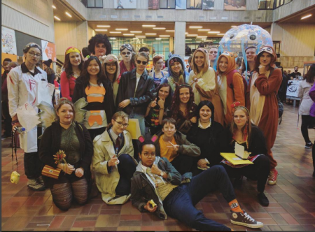 Students in costume participating in Trick or Eat 2016