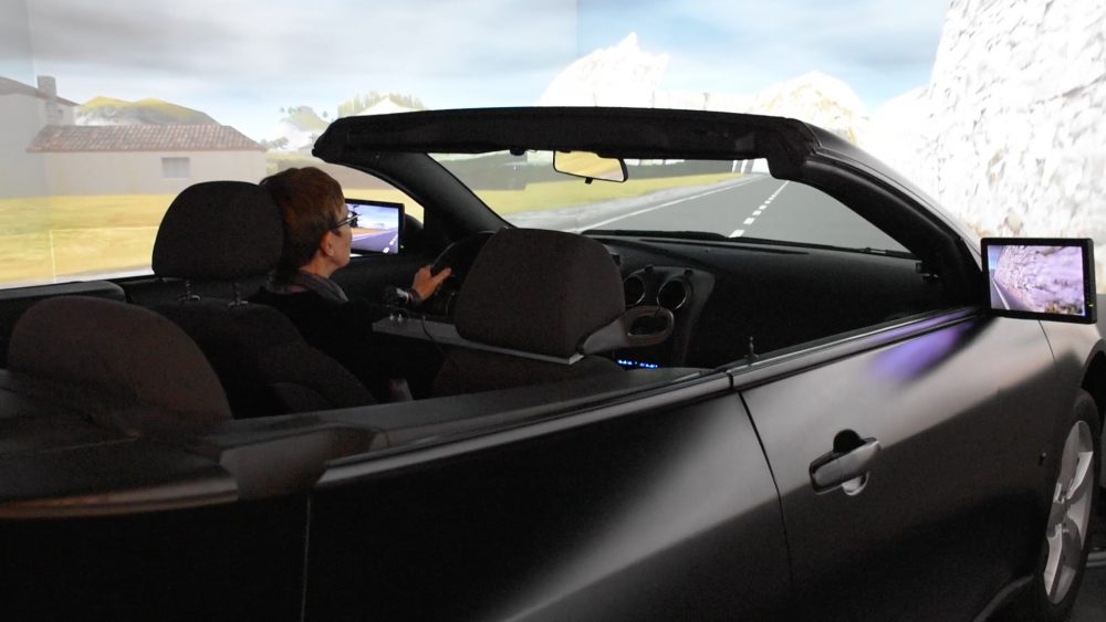 Prof Lana Trick driving in the drive lab simulator