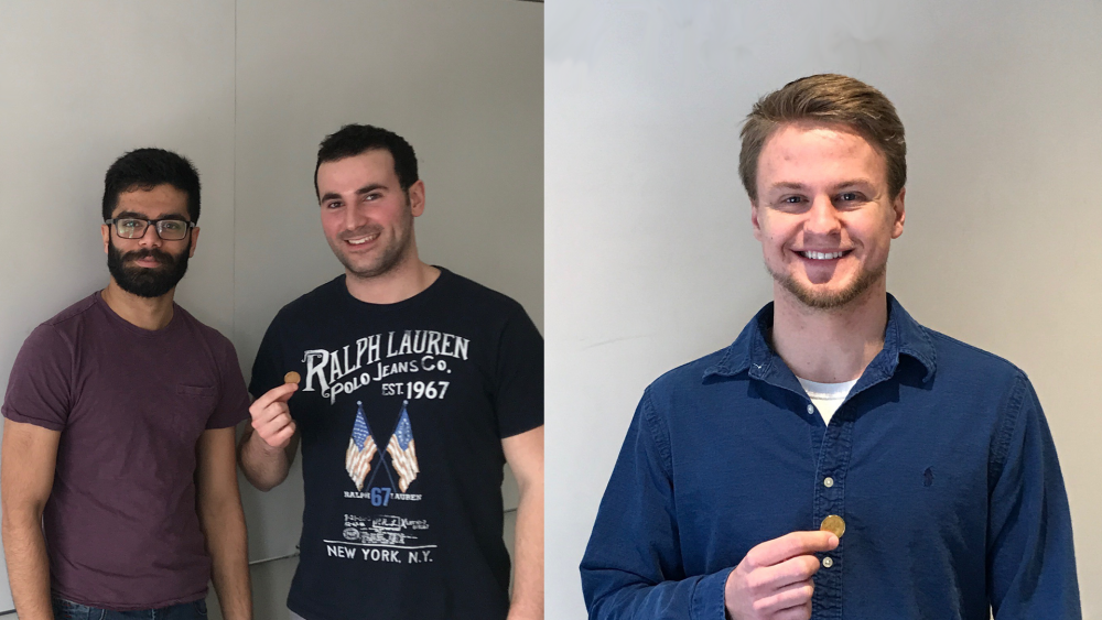 Students from the 2018 Micro-Tyco teams, each holding their $1 in seed funding