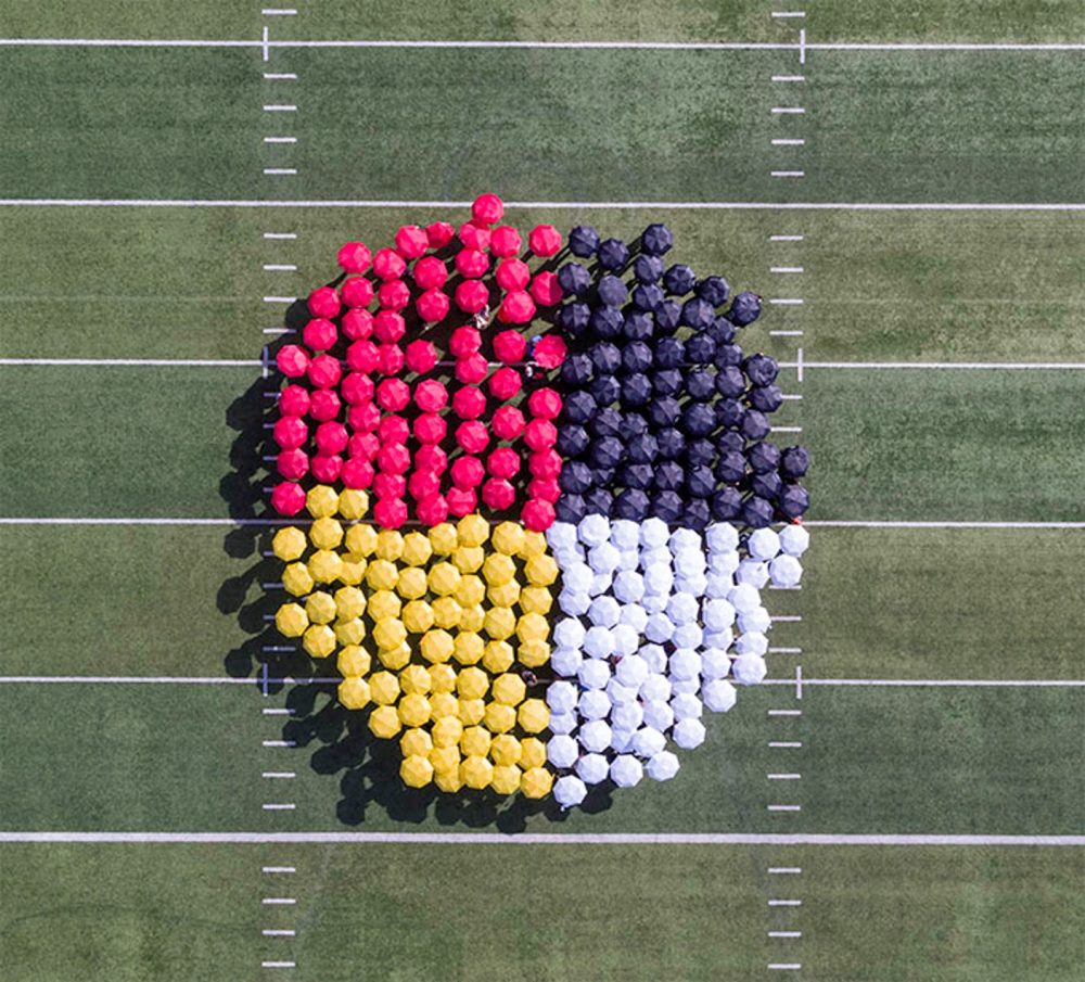 Aerial photo of medicine wheel formed using umbrellas
