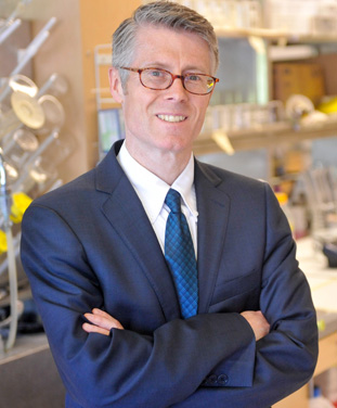 photo of Malcolm Campbell, vice-president (research) with his arms folded
