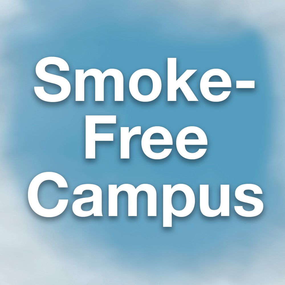 Clearing sky with text "Smoke-Free Campus"