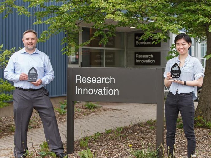 Chris Grainger of Harvest Genomics and Jane Ong of NeopPhoto Foods stand outside the Research Innovation Office