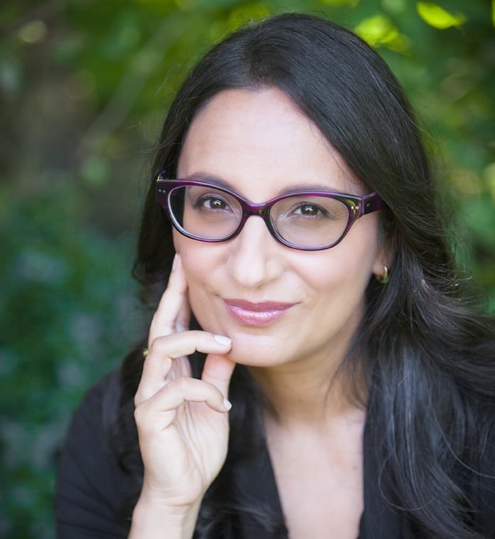 A headshot photo of Dr. Madhur Anand
