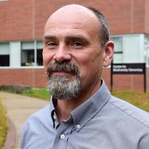 Dr. Robert Hanner poses for a headshot outside