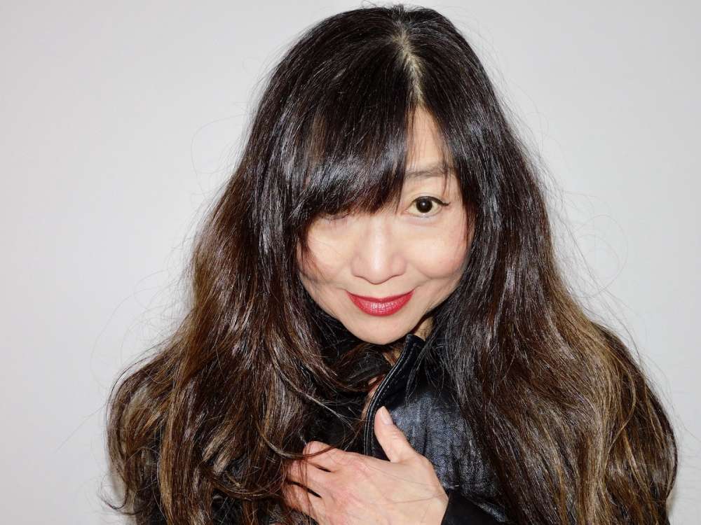 Asian woman with long dark hair