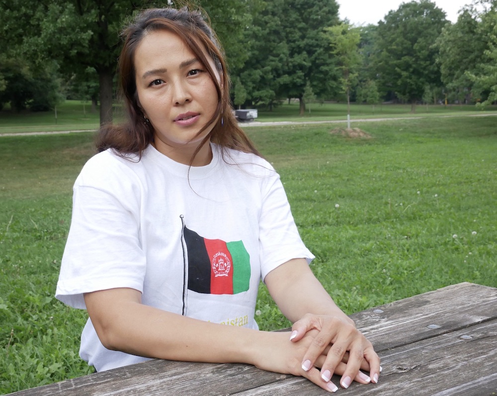 Afghan women with Afghanistan t-shirt