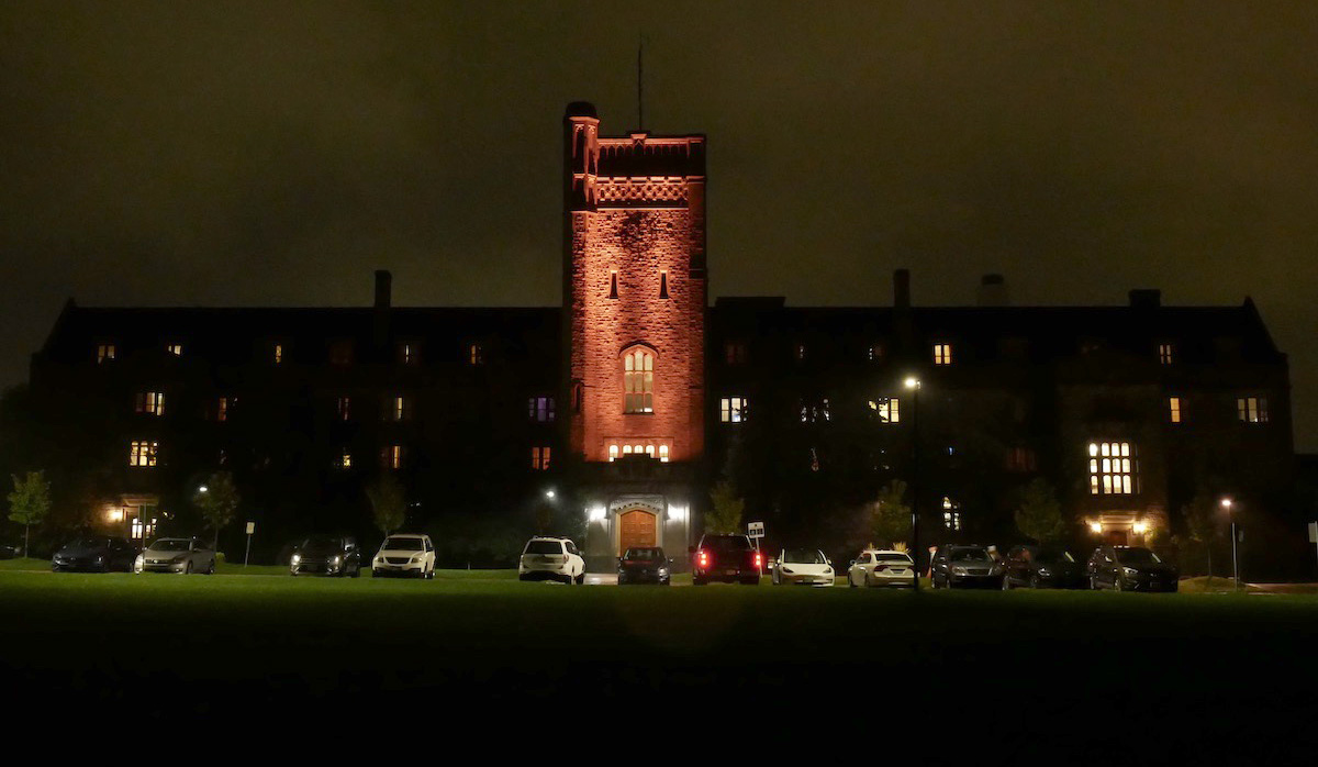 Johnston Tower lit up orange for Truth and Reconciliation Week