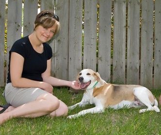 woman on left, dog on right