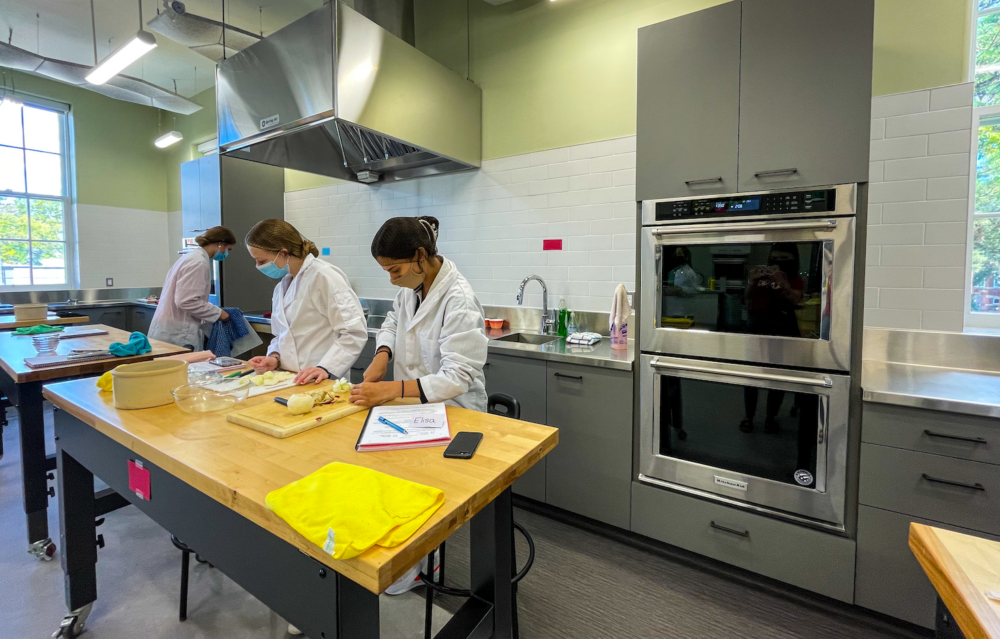 interior of food lab with 3 students