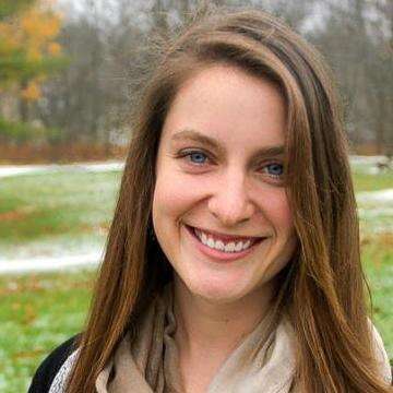 PhD candidate Emily Duncan poses for a headshot outside
