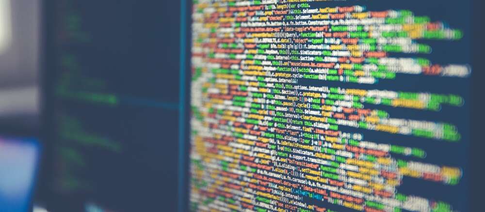 Colorful software or web code on a computer monitor