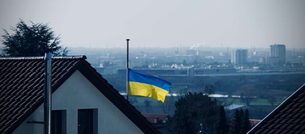 The Ukrainian flag (top half blue, bottom half yellow) flies at half mast in Germany.