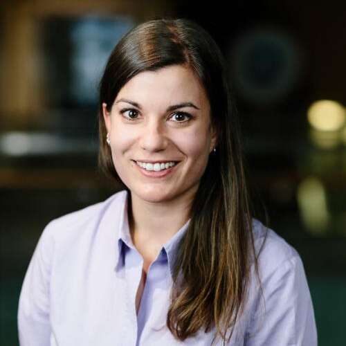 Dr. Daniela Senkl poses for a headshot indoors.