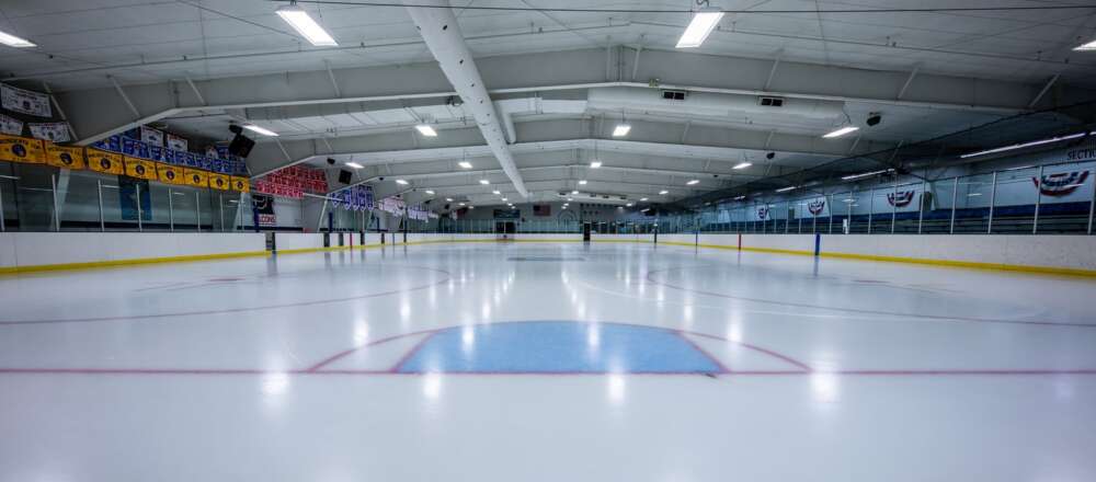 An empty indoor ice hockey rink