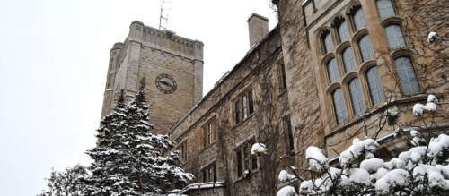 Closeup of Johnston Hall on the U of G campus covered in snow