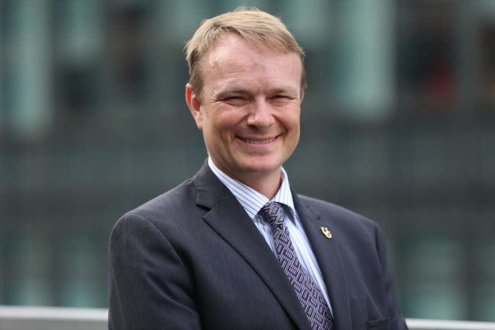 Dr.. Evan Fraser smiles for a portrait