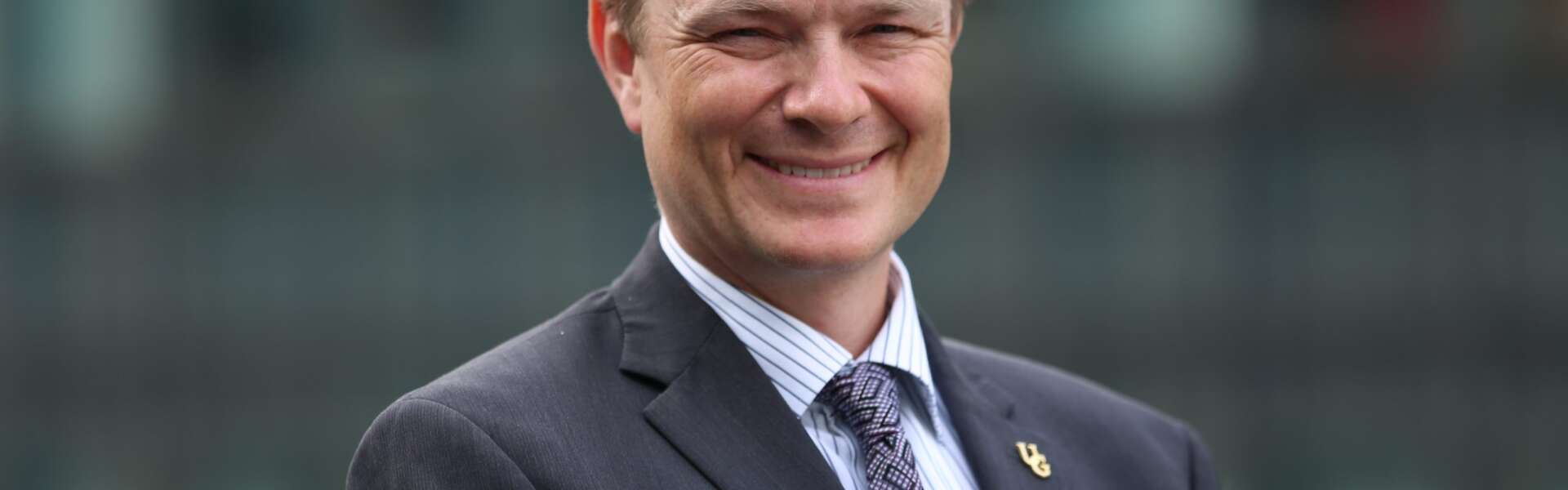 Dr.. Evan Fraser smiles for a portrait