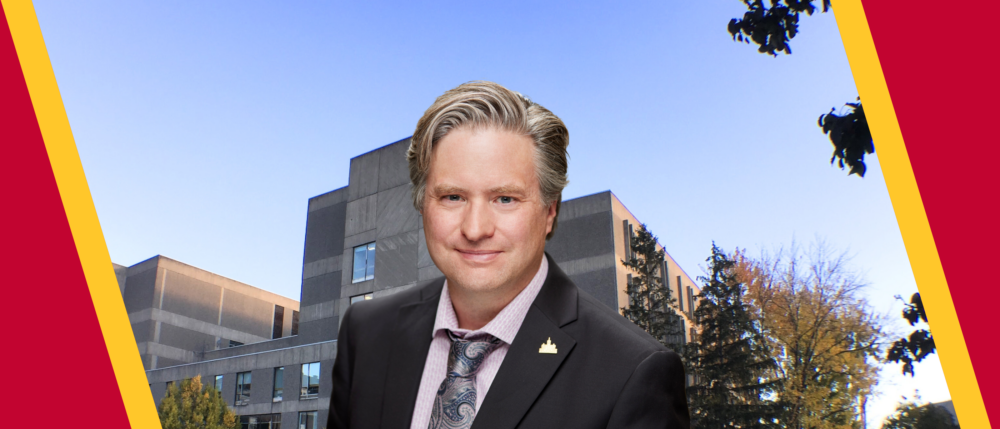 Dr. Bill Rosehart against U of G institutional background on a clear sunny day.