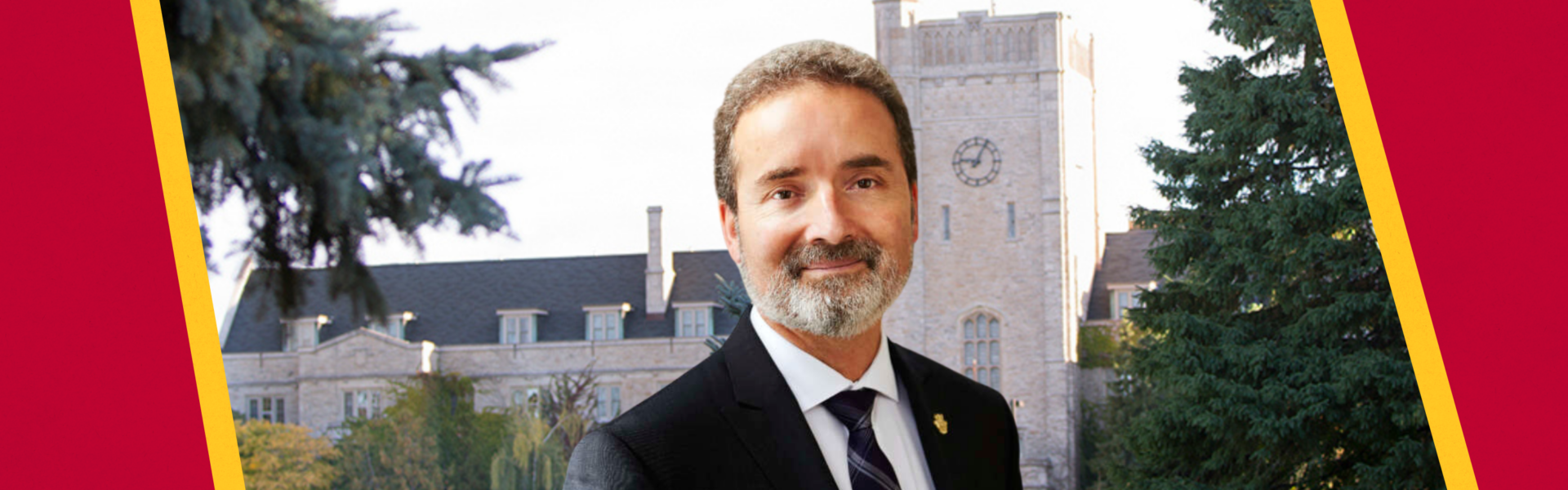 Dr. Rene Van Acker, dressed in a suit, against an institutional background with red and gold branding at the sides.