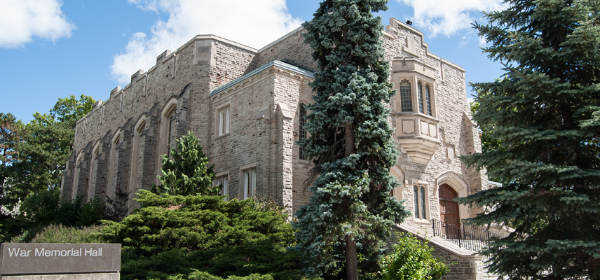 War memorial hall, a grey stone building from the early 1900s.