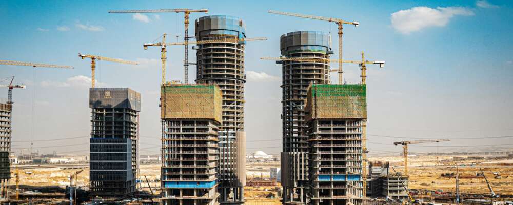 a group of tall buildings under construction