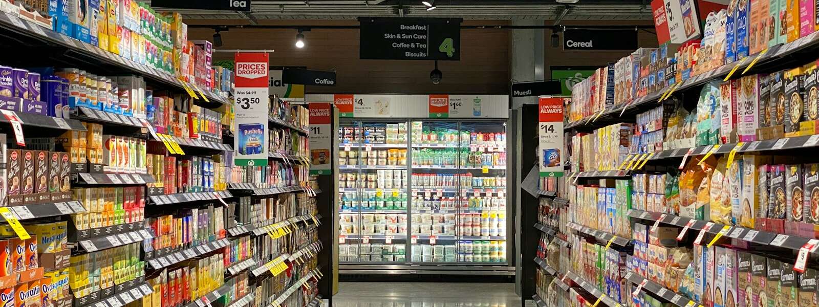 white and red labeled pack on white shelf